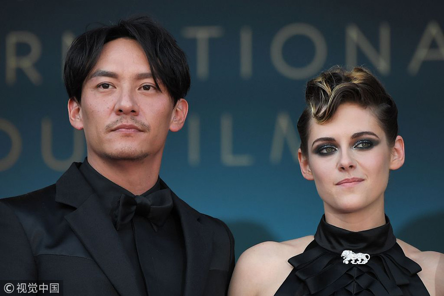 李宇春郭富城領(lǐng)銜中國軍團亮相 戛納紅毯刮起中國風(fēng)（組圖）